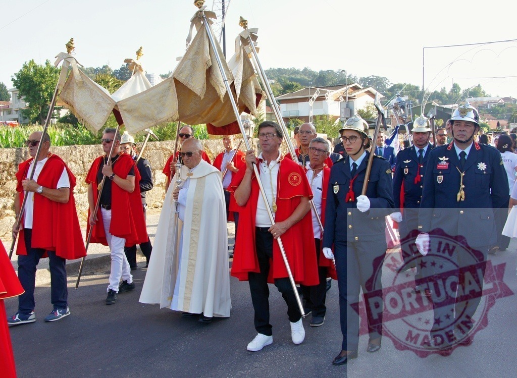 Religious procession walking on the street | Procession 15.08.2025 - Assumption Day - Paco de Sousa, Portugal Catholic priests and firefighters walking a religious procession on the street - Realized with Pictrs.com