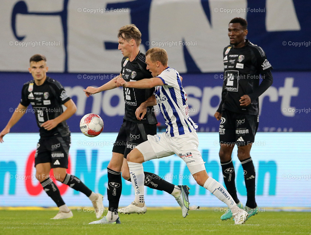 A_LUI_191024_14 | SPORT,FUSSBALL,ADMIRAL BUNDESLIGA BLAU WEISS LINZ-RZ PELLETS WAC 19.10.2024 IM BILD :THOMAS GOINGINGER (BL.WEISSLINZ) UND SIMON PIESINGER  (WAC) FOTOLUI/MW
