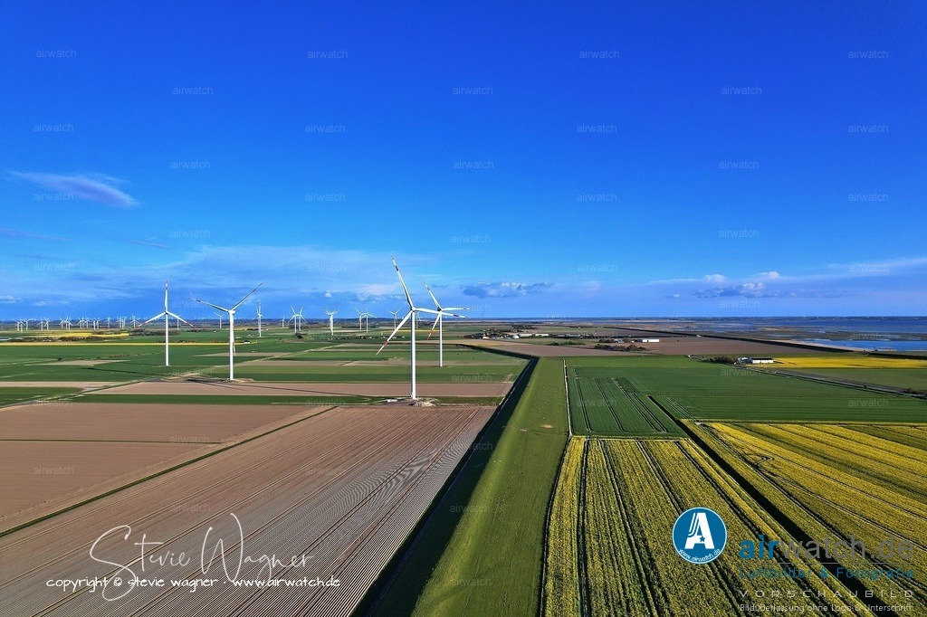 Windpark Reussenköge - Bürgerwindpark Reußenköge | Entdecken Sie atemberaubende Luftbilder und Fotografien auf airwatch.de - Tauchen Sie ein in eine Welt voller faszinierender Aufnahmen aus der Vogelperspektive.