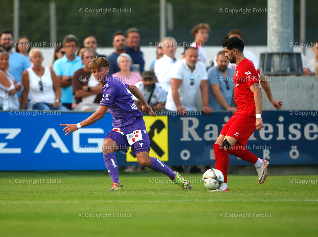 A_LUI_280824_11 | SPORT FUSSBALL UNIQA OEFB CUP 2024 2.RUNDE ASKOE OEDT-WIENER AUSTRIA 28.08.2024 IM BILD: BUENYAMIN KARATAS (OEDT) UND MUHAREM HUSKOVIC (AUSTRIA) FOTO:FOTOLUI