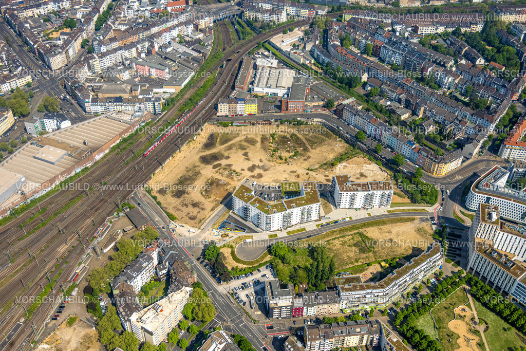Duesseldorf240501025 | Luftbild, Grand Central Düsseldorf, Erkrather Straße, Baustelle Czernowitz Straße, Bahngleise mit S-Bahn, Wohnviertel, Oberbilk, Düsseldorf, Rheinland, Nordrhein-Westfalen, Deutschland