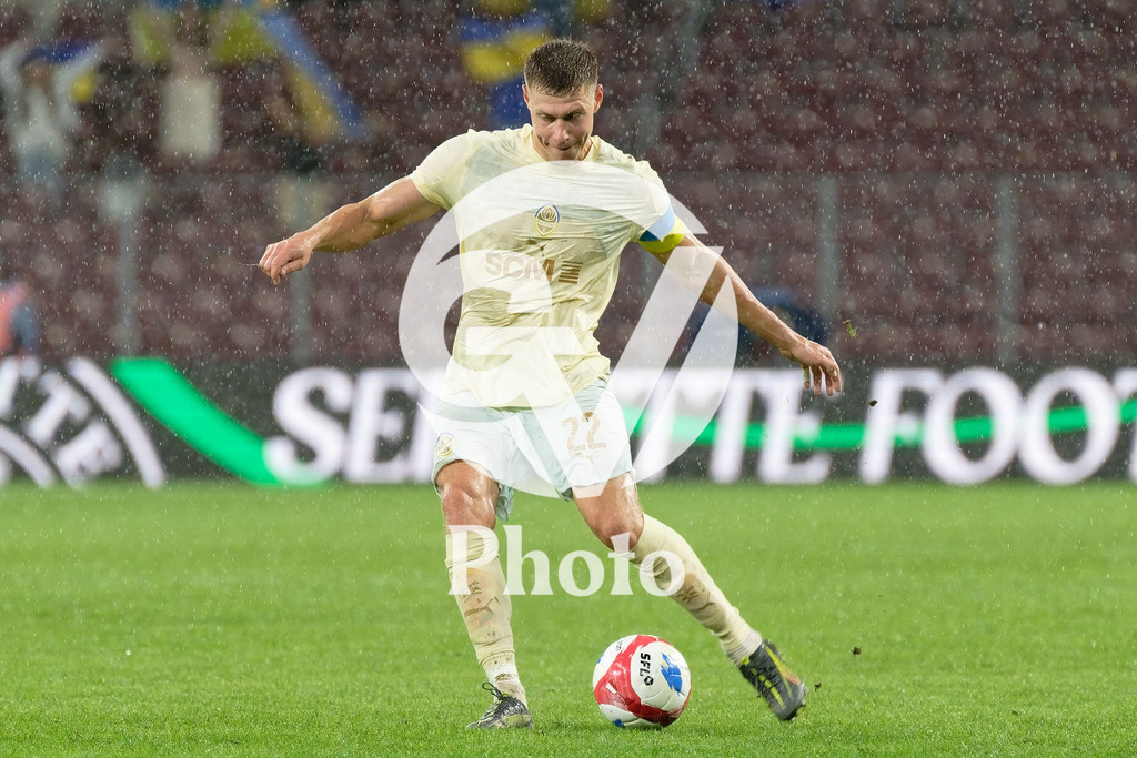 UEFA Conference League Play-offs 2nd leg - Servette FC v FC Shakhtar Donetsk | Mykola Matviyenko (22 FC Shakhtar Donetsk) shoots the ball (action)  during the UEFA Conference League Play-offs 2nd leg match between Servette FC and FC Shakhtar Donetsk at Stade de Geneve in Geneva, Switzerland