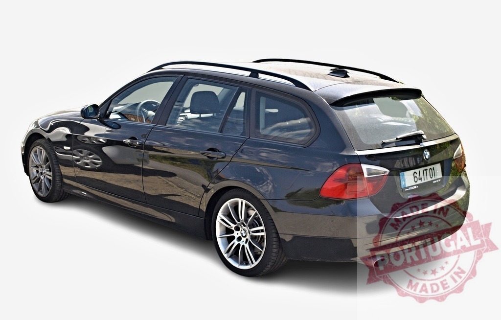 BMW 3 Series Touring car parked on white background | Shiny black BMW station wagon isolated on white background, showing elegance and style - Realized with Pictrs.com