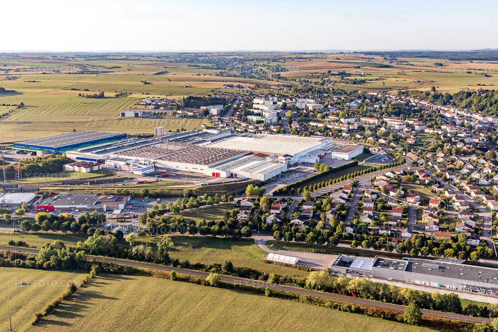 Aerial view: Food manufacturer - Nestlé Waters Supply Est factory site in Contrexeville in Contrexéville in the state Vosges, France. – Photo: IMG_118437.jpg taken on 09/16/2019 by Werner Riehm/FLY-FOTO.com – Resolution of the original: 5472 x 3648 px