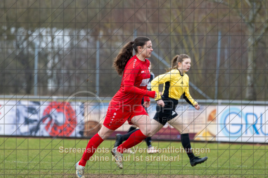 20250316_130638_0007 | #,1.FC Donzdorf (rot) vs. SpVgg Gröningen-Satteldorf (schwarz), Fussball, Frauen-Verbandsliga Württemberg, 13. Spieltag, Saison 2024/2025, Rasenplatz Lautertal Stadion, Süßener Straße 16, 73072 Donzdorf, 16.03.2025 - 13:00 Uhr,Foto: PhotoPeet-Sportfotografie/Peter Harich