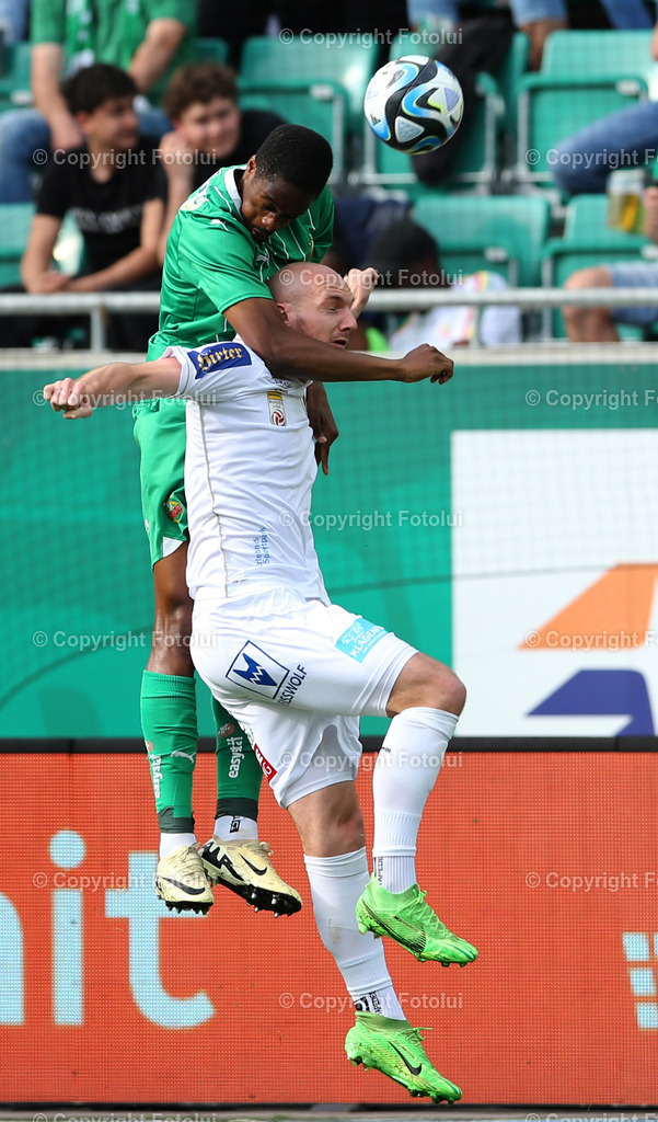 A_LUI_14042024_05 | SPORT,FUSSBALL.ADMIRAL BUNDESLIGA SK RAPID-AUSTRIA KLAGENFURT14.04.2024 IM BILD:TERENCE KONGOLO (RAPID) UND NICOLAS WIMMER (KLAGENFURT) FOTO.FOTOLUI/MW