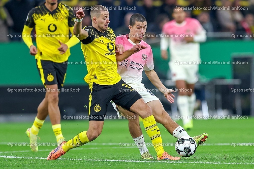 BVB02122501020 | 02.12.2025, Fußball, DFB-Pokal, Borussia Dortmund - Bayer 04 Leverkusen, Achtelfinale, Signal Iduna Park, Saison 2025 2026: b03 im Zweikampf gegen  Ibrahim Maza (Bayer04 #30) DFB regulations prohibit any use of photographs as image sequences and or quasi-video.