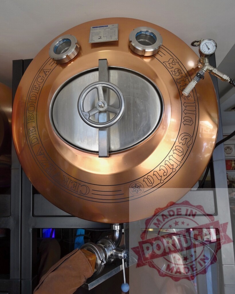 Estrella Galicia beer tank brewing process equipment | Estrella Galicia copper beer tank and brewery equipment for crafting beverages - Realized with Pictrs.com