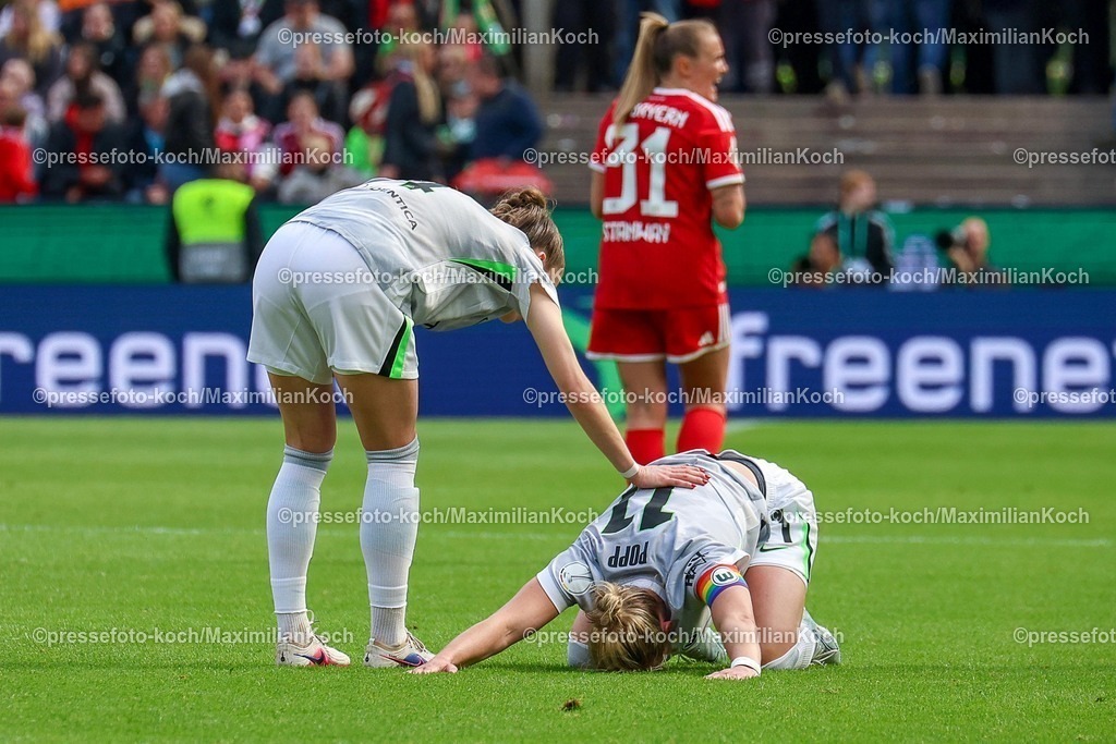 xsscx14052601034 | 2026.05.14, xsscx, Fußball, Finale DFB-Pokal Frauen, VfL Wolfsburg -  FC Bayern München, Saison 2025 2026, Rhein-Energie-Stadion in Köln: Alexandra Popp (VfL Wolfsburg #) liegt mit schmerzendem Rücken am Boden DFB regulations prohibit any use of photographs as image sequences and or quasi-video. Photo: xSandraxScherningxPressefotoKochx