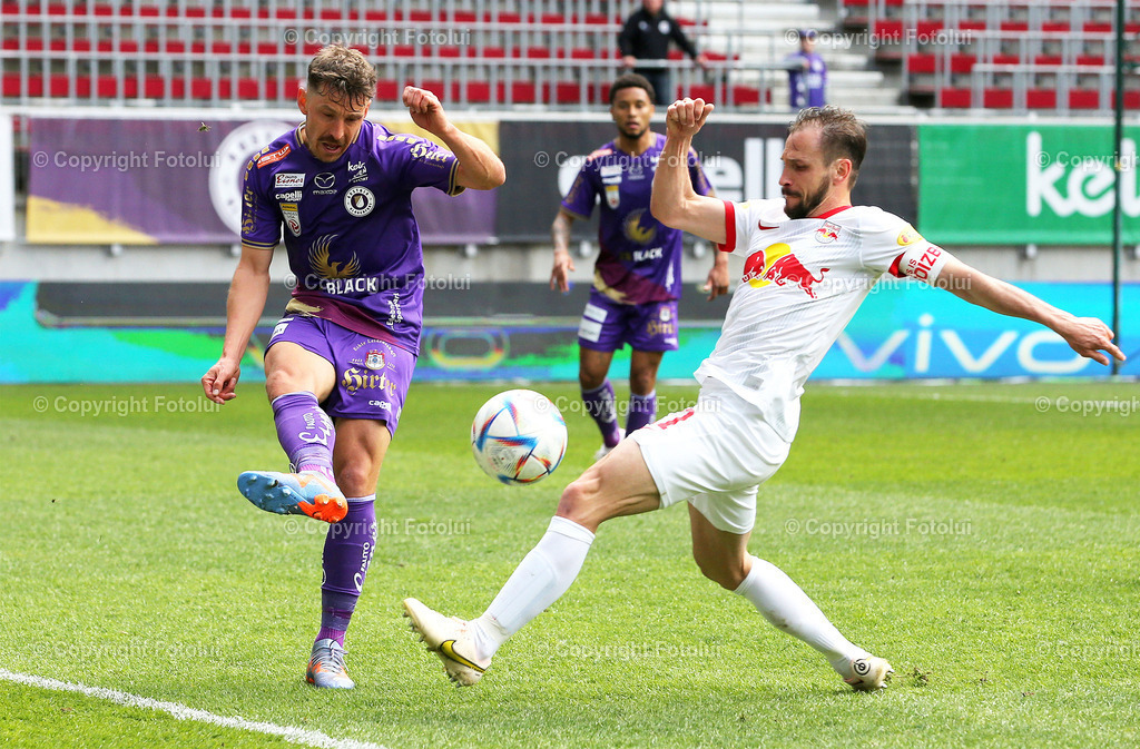 ALUI_02042023_02 | SPORT,FUSSBALL,ADMIRAL BUNDESLIGA AUSTRIA KLAGENFURT-RED BULL SALZBURG  02.04.2023 IM BILD:CHRISTOPHER WERNITZIG (KLAGENFURT) UND  ANDREAS ULMER  (RED BULL SALZBURG) FOTO:FOTOLUI/MW