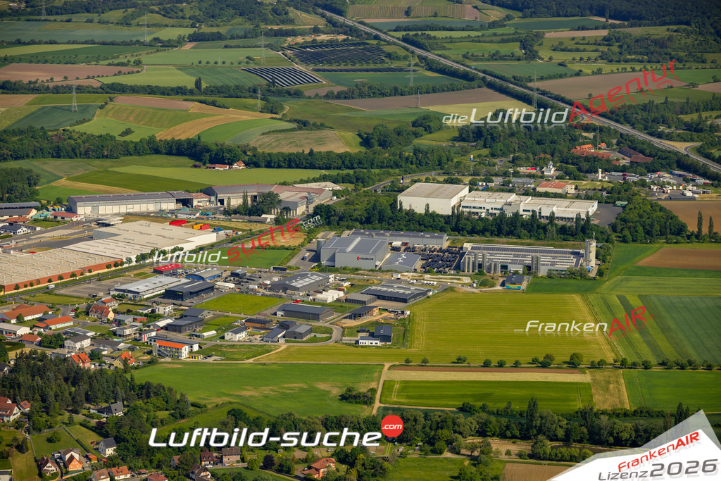 Das Luftbild zeigt Gewerbegebiet Knetzgau - Die Luftaufnahme wurde 2023 vom UL-Flugzeug aus erstellt ( keine Drohne ) - Hochauflösende Luftaufnahme - Für grossformatige Ausdrucke geeignet. Die Geschenkidee !Mit Lizenz und Bildrechte bestellbar