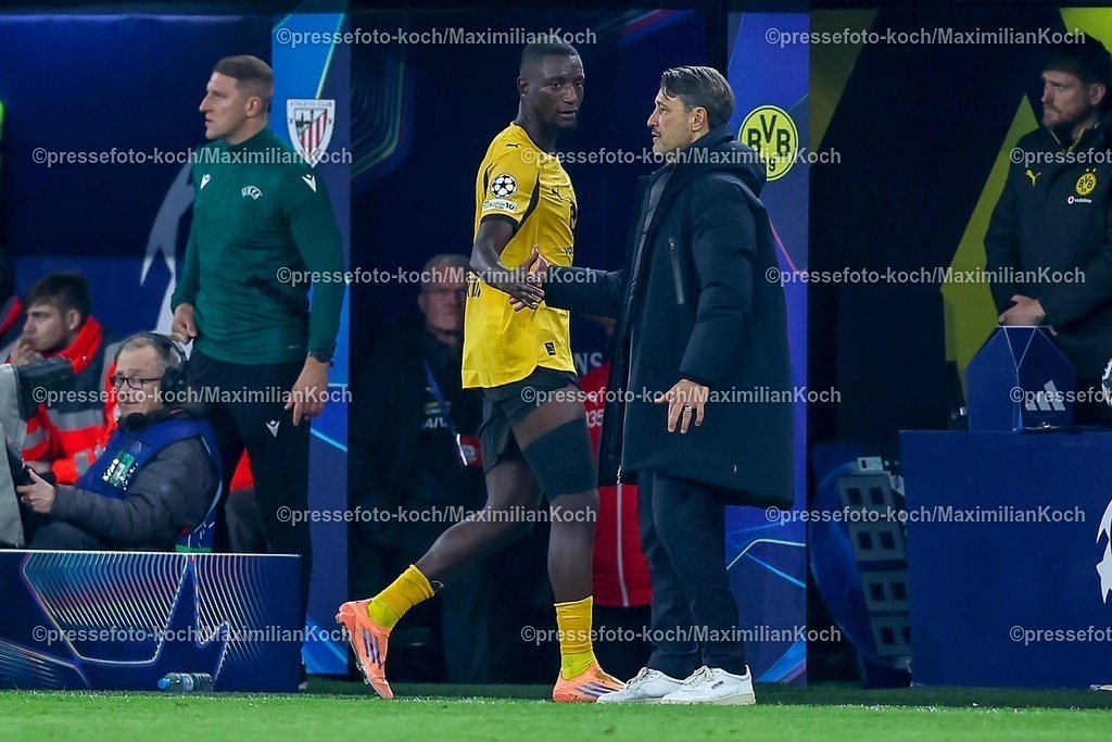 UCL01102501245 | 01.10.2025, Fußball, UEFA Champions League, Borussia Dortmund - Athletic Club Bilbao, BVB Stadion, 2. Spieltag, Saison 2025 2026: Serhou Guirassy (BVB #09) neben Cheftrainer Niko Kovac (BVB #hc)  Regulations prohibit any use of photographs as image sequences and or quasi-video.