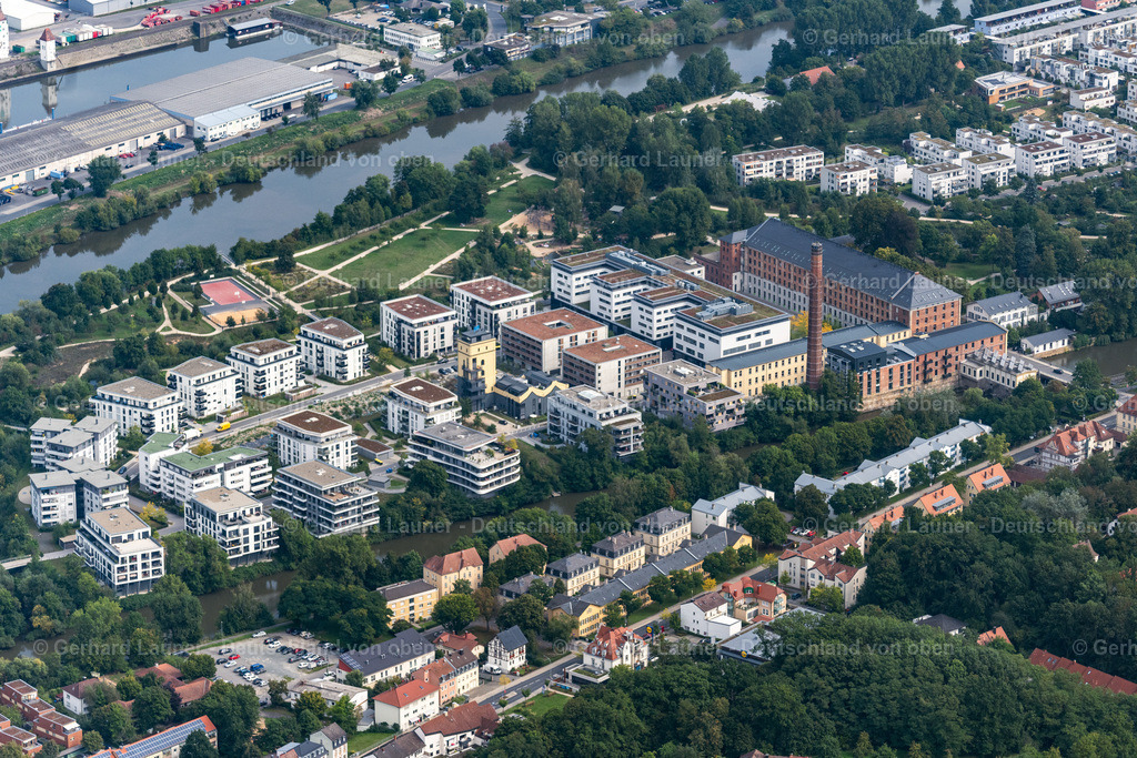 4060119 | BAMBERG 07.09.2021 Wohngebiet einer Mehrfamilienhaussiedlung "ALTE SPINNEREI" auf der Erbainsel an der Krackhardtstraße in Bamberg im Bundesland Bayern, Deutschland. Weiterführende Informationen bei: Reinhart Immobilien Marketing GmbH &amp; Co. KG. // Residential area of a multi-family house settlement "ALTE SPINNEREI" auf of Erbainsel on Krackhardtstrasse in Bamberg in the state Bavaria, Germany. Further information at: Reinhart Immobilien Marketing GmbH &amp; Co. KG. Foto: Gerhard Launer