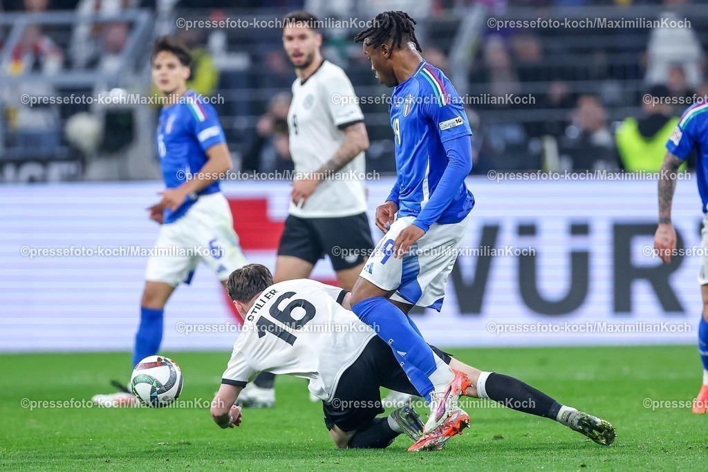 DFB23032501043 | 23.03.2025, Fußball, Viertelfinale UEFA Nations League, Deutschland - Italien, Signal Iduna Park, Saison 2024 2025: Angelo Stiller (GER #16) im Zweikampf gegen Iyenoma Destiny Udogie (ITA #19) DFB regulations prohibit any use of photographs as image sequences and or quasi-video.
