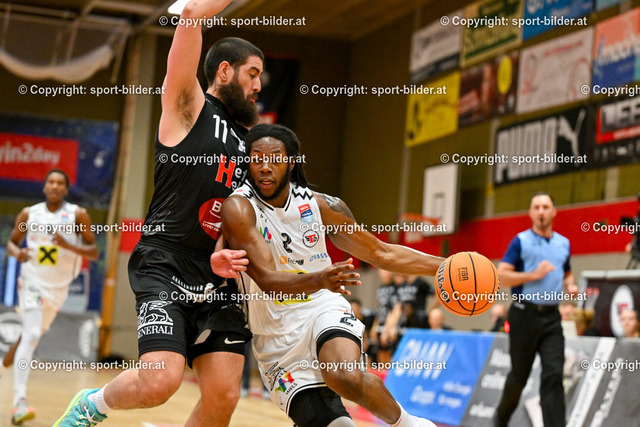 AUT, BSL, Basketball Flyers Wels vs Bulls Kapfenberg | 19.10.2024, Raiffeisen Arena Wels, AUT, BSL, Flyers Wels vs Bulls Kapfenberg, im Bild Jordan Ngatai of Bosco Bulls Kapfenberg and Damion Rosser of Raiffeisen Flyers Wels// BSL, Basketball Super League Match between Raiffeisen Flyers Wels and Bulls Kapfenberg in Wels, Austria on 2024/10/19
