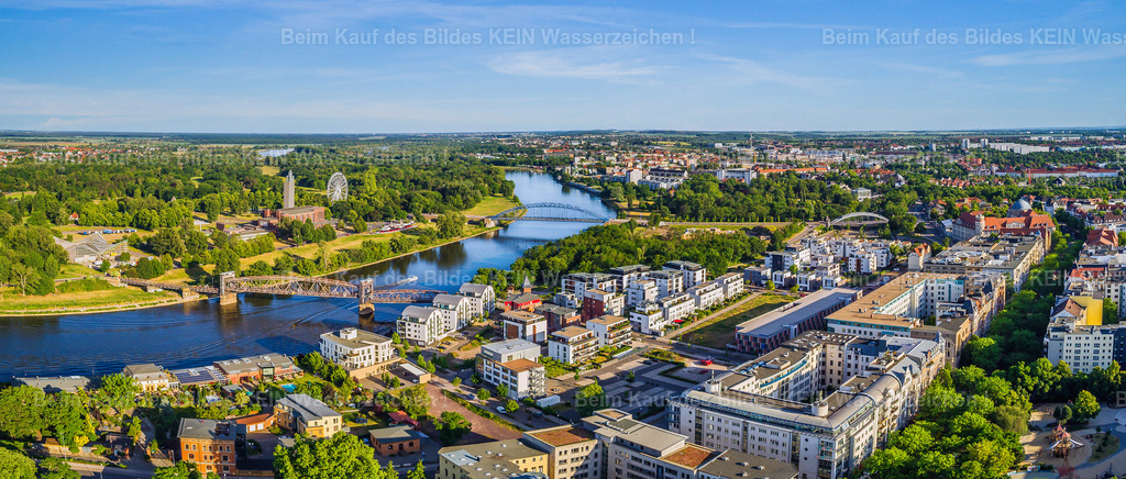 Pano_Magdeburg_Luftbild_Schleinufer_Hegelstraße_Elbe_Elbbahnhof_Stadtpark | Diese Luftaufnahme gehört zu einer umfangreichen Sammlung weiterer Luftbilder aus Magdeburg. Sie zeigt die Landeshauptstadt aus einer außergewöhnlichen Perspektive und ergänzt die schönsten Ansichten um viele weitere interessante Motive. Selbstverständlich können auch diese Luftbilder als Download oder hochwertiges Wandbild erworben werden.
 - Realisiert mit Pictrs.com