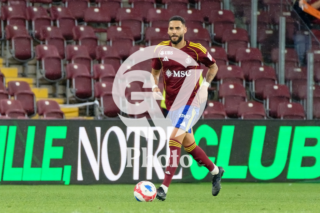 UEFA Conference League Play-offs 2nd leg - Servette FC v FC Shakhtar Donetsk | Dylan Bronn (25 Servette FC) controls the ball (action)  during the UEFA Conference League Play-offs 2nd leg match between Servette FC and FC Shakhtar Donetsk at Stade de Geneve in Geneva, Switzerland