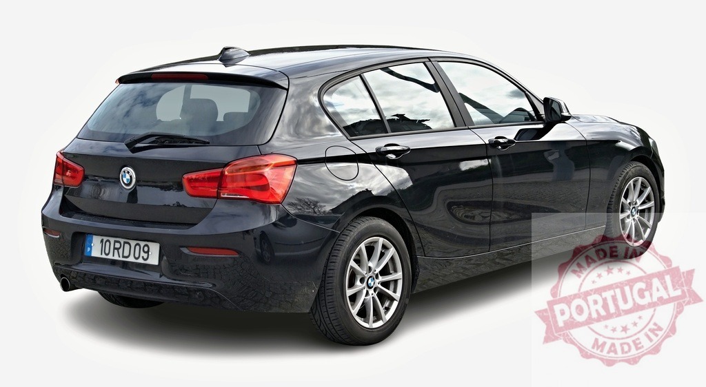 Shiny black BMW 1 series is parked on white background | Rear view of a modern five-door hatchback BMW car, parked on a seamless white background - Realisiert mit Pictrs.com