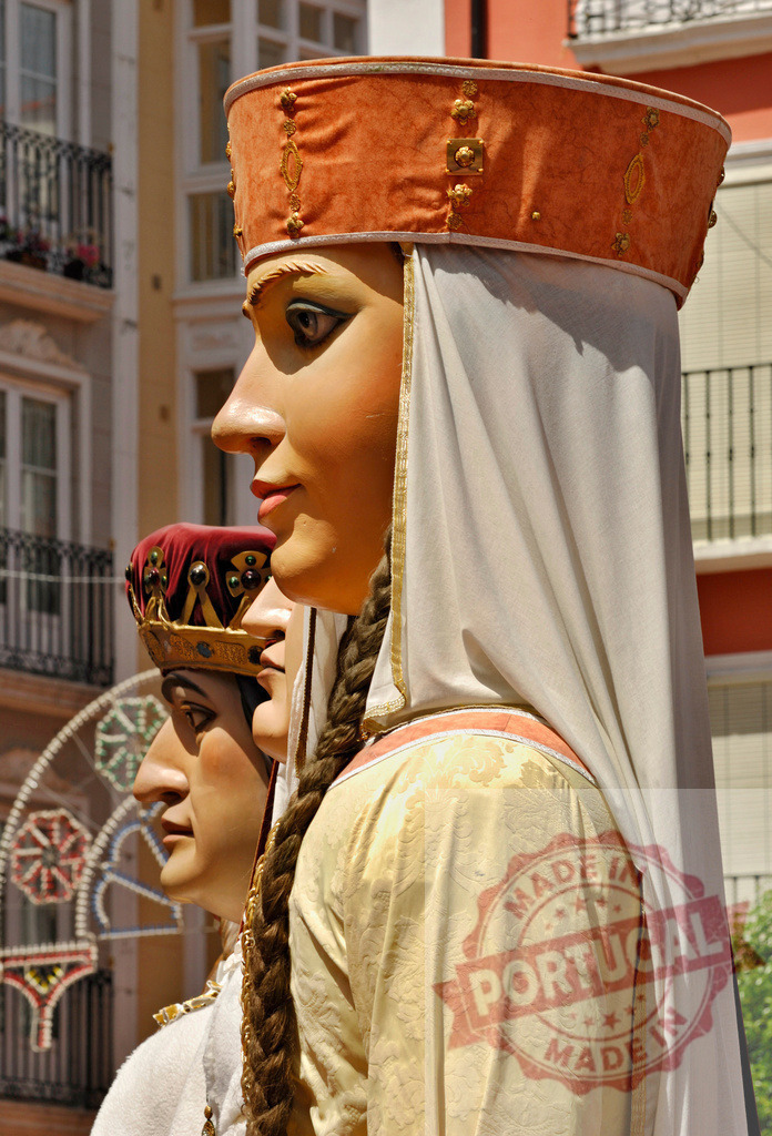 Gegants parade traditional festival figures in Spain. Spain - Burgos | Giant papier-mâché figures representing old kings and queens parading during a Spanish festival - Realized with Pictrs.com
