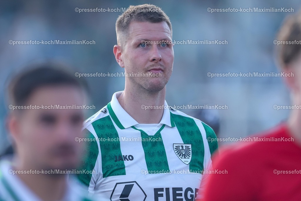 SCP09052502290 | 09.05.2025, Fußball, Preußen Münster - Hertha BSC, 2. Fußball Bundesliga, 33. Spieltag, Preußenstadion, Saison 2024 2025: Holmbert Aron Fridjonsson (Preussen Muenster #31) DFB regulations prohibit any use of photographs as image sequences and or quasi-video.