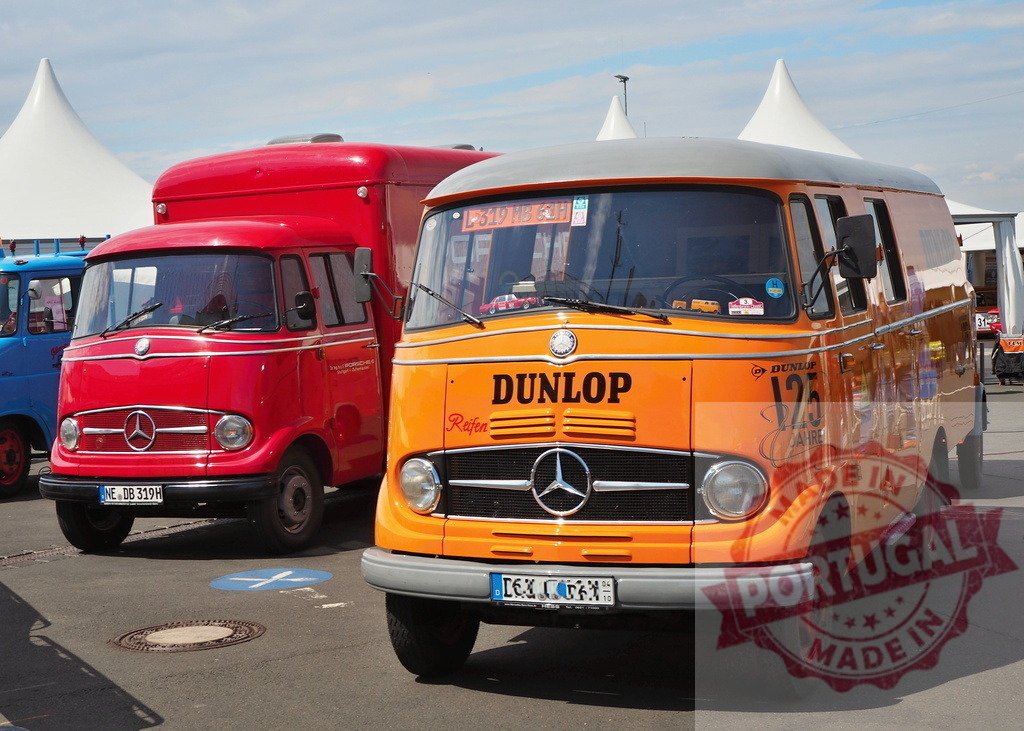 Mercedes L319 vintage vans at classic automobile show | Orange and red Mercedes L319 vans parked at an outdoor classic vehicle event - Realisiert mit Pictrs.com