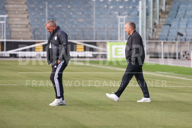 Grazer AK 1902 vs TSV Egger Glas Hartberg – Austrian Bundesliga Match 2025 | Austrian Bundesliga match between Grazer AK 1902 and TSV Egger Glas Hartberg. Dynamic football action, players in motion, emotions, stadium atmosphere and team spirit captured in professional detail. The image shows head coach from TSV Hartberg Manfred Schmid.