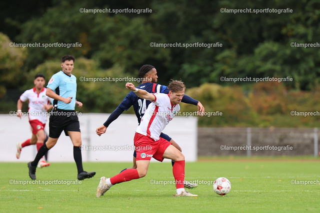 Fußball I Herren I Saison 2025-2026 I Regionalliga Nord I 13. Spieltag I 1. FC Phönix Lübeck - VfB Lübeck I 05.10.2025.050 | v.l. Benjamin Luis (24, 1. FC Phönix Lübeck), Luca Menke (5, VfB Lübeck) - Realisiert mit Pictrs.com