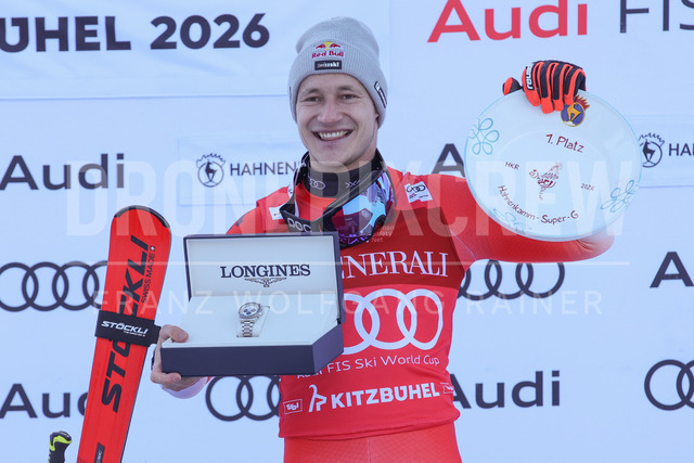 Audi FIS Ski World Cup: Men’s Slalom – Hahnenkamm Race, Kitzbuehel | Kitzbuehel, Austria, 25.Jan.26 - Alpine Skiing - FIS World Cup, Hahnenkamm Race, Slalom, men. The image shows ODERMATT Marco (SUI, Stoeckli) with trophy and Longines watch.