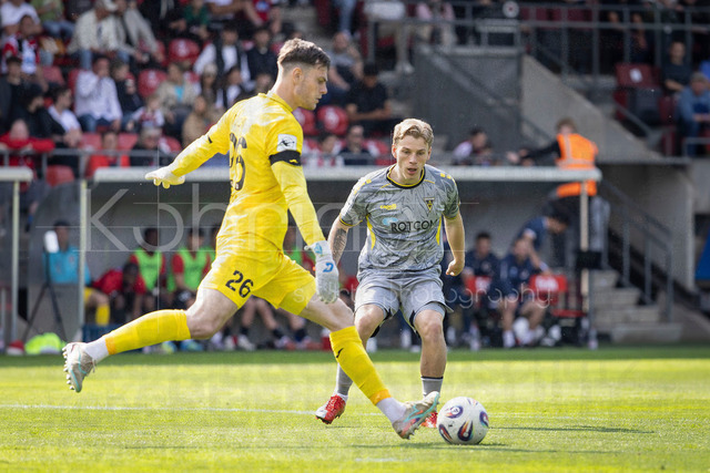 German 3rd Division, Viktoria Koeln vs. Alemannia Aachen, 10.05.2026 | KOELN, GERMANY - MAY 10, 2026: David Richter (Viktoria Köln, 26) is challenged by Jonas Oehmichen (Alemannia Aachen, 24) during the 3rd division match on gameday 37 between Viktoria Koeln vs. Alemannia Aachen at the Sportpark Hoehenberg on May 10, 2026 in Koeln, Germany. DFL REGULATIONS PROHIBIT ANY USE OF PHOTOGRAPHS AS IMAGE SEQUENCES AND/OR QUASI-VIDEO.