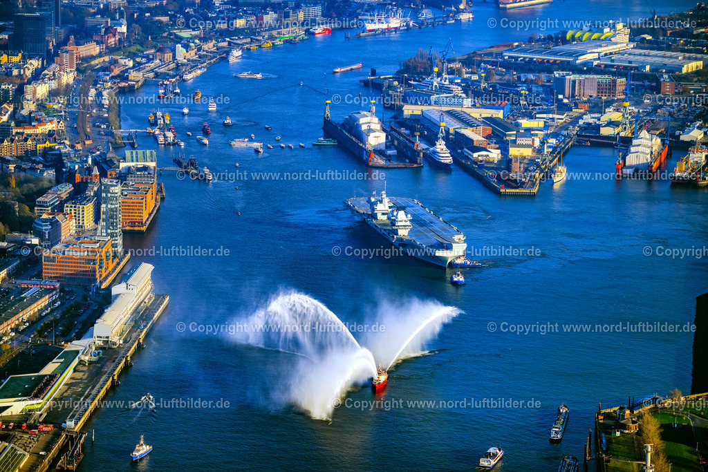 Hamburg_Flugzeugträger_Queen_Elisabeth_ELS_3315231124 | HAMBURG 23.11.2024 Graufarbener Flugzeugträger und Kriegs- Schiff der britischen Marine Royal Navy HMS "Queen Elizabeth" im Ortsteil Steinwerder in Hamburg, Deutschland. Weiterführende Informationen bei: Hamburger Hafen und Logistik Aktiengesellschaft. // Grey aircraft carrier and warship of the British Royal Navy HMS "Queen Elizabeth" in the Steinwerder district of Hamburg, Germany. Further information at: Hamburger Hafen und Logistik Aktiengesellschaft. Foto: Martin Elsen