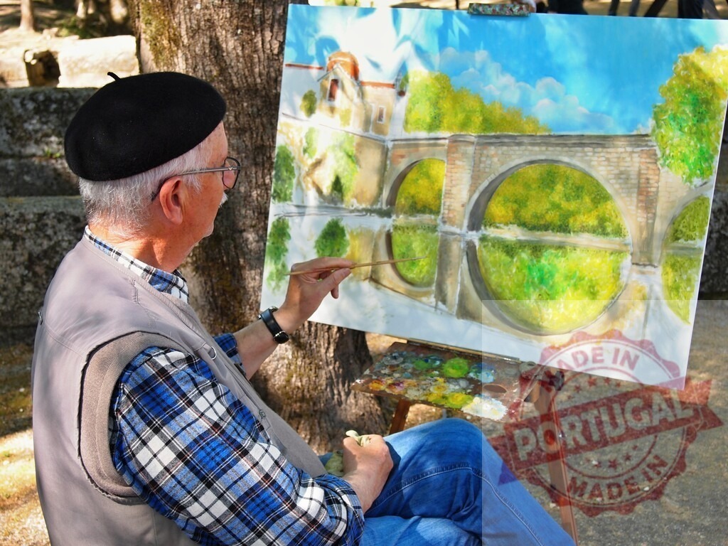 Senior artist painting a landscape outdoors, wearing a beret | Senior artist painting a scenic aqueduct landscape on canvas outdoors in nature - Realized with Pictrs.com