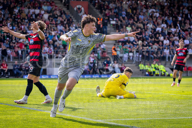 German 3rd Division, Viktoria Koeln vs. Alemannia Aachen, 10.05.2026 | KOELN, GERMANY - MAY 10, 2026: Faton Ademi (Alemannia Aachen, 36) celebrates scoring his team's first goal with teammates during the 3rd division match on gameday 37 between Viktoria Koeln vs. Alemannia Aachen at the Sportpark Hoehenberg on May 10, 2026 in Koeln, Germany. DFL REGULATIONS PROHIBIT ANY USE OF PHOTOGRAPHS AS IMAGE SEQUENCES AND/OR QUASI-VIDEO.