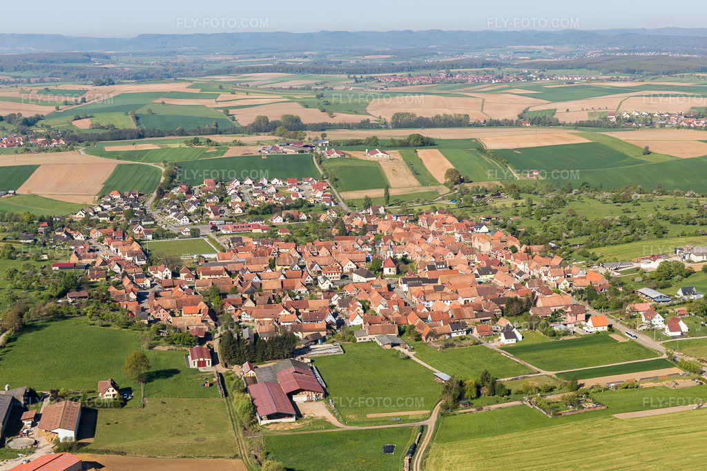 Aerial view: Agricultural fields and arable land in Uhrwiller in the state Bas-Rhin, France. – Photo: IMG_099441.jpg taken on 04/30/2017 by Werner Riehm/FLY-FOTO.com – Resolution of the original: 5472 x 3648 px