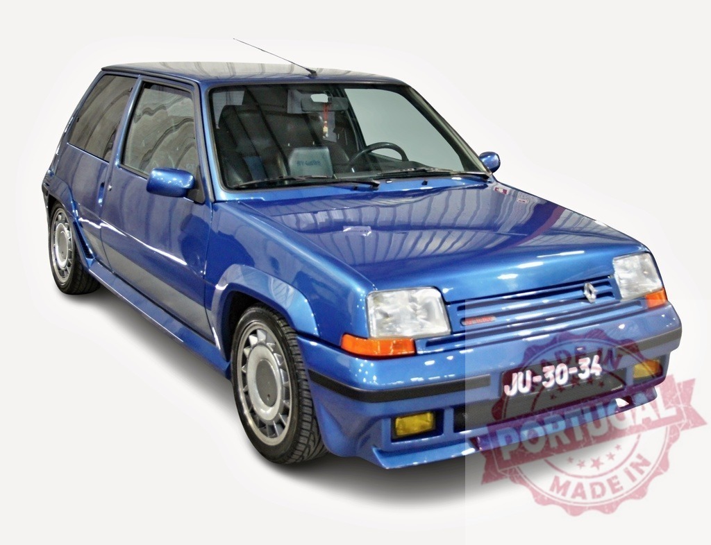 Renault 5 GT Turbo showcasing its iconic eighties design in blue | Powerful Renault 5 GT Turbo posing in a white studio, representing the eighties hot hatch era - Realized with Pictrs.com