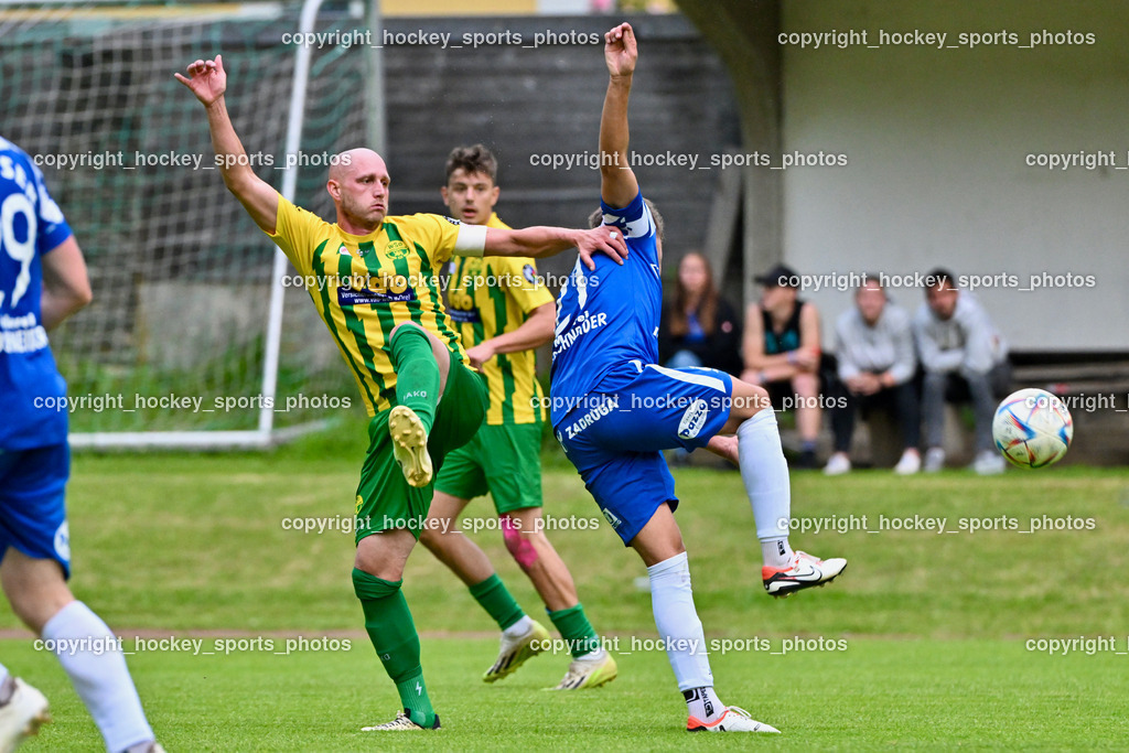 WSG Radenthein vs. St. Michael ob Bleiburg | #12 Stefan Rauter WSG Radenthein, #21 Philipp Gerhard Pachoinig St. Michael ob Bleiburg, WSG Radenthein vs. St. Michael ob Bleiburg, WSG Radenthein vs. St. Michael ob Bleiburg  am 15.06.2024 in Radenthein (Sportplatz Radenthein), Austria, (Photo by Bernd Stefan)