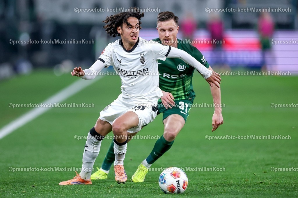 BMG13122502143 | 13.12.2025, Fußball, Borussia Mönchengladbach - VfL Wolfsburg, 1. Fußball Bundesliga, 14.Spieltag, Borussia-Park, Saison 2025 2026: Wael Mohya (Borussia Mönchengladbach #36) im Zweikampf gegen  Yannick Gerhardt&nbsp;(VfL Wolfsburg #31)  DFB regulations prohibit any use of photographs as image sequences and or quasi-video.