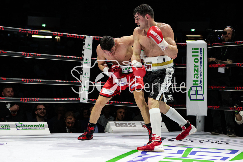 Profi - Box - Gala / Main Event | Robin KRASNIQI (rote Hose) in seinem Kampf gegen Rimour NIKARKHOEV (Schwarze Hose)