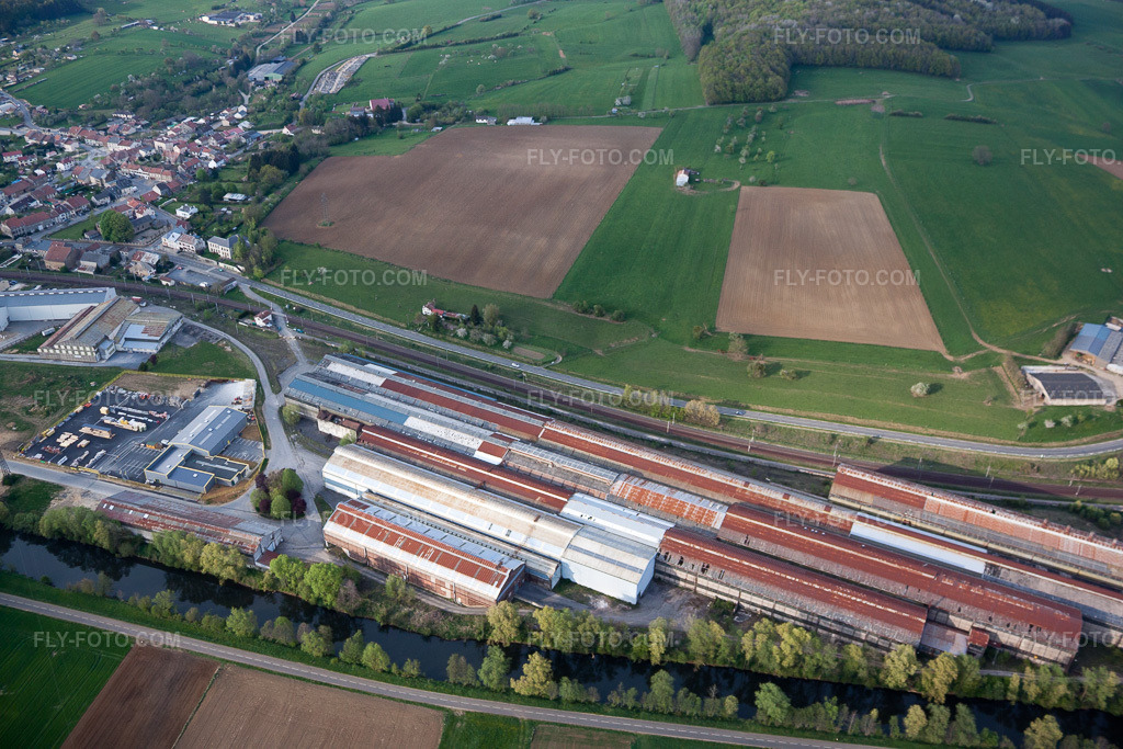 Aerial view: Railway depot and repair shop, maintenance and repair of trains in Blagny in the state Ardennes, France. – Photo: IMG_39788.jpg taken on 04/16/2011 by Werner Riehm/FLY-FOTO.com – Resolution of the original: 4752 x 3168 px