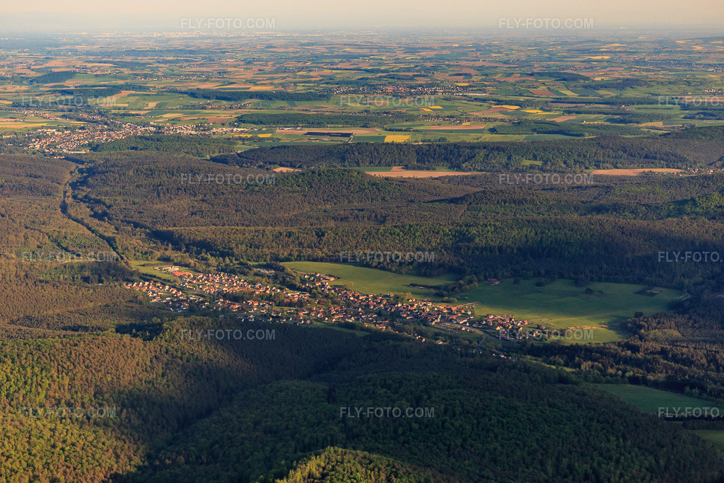 Aerial view: Village view in the Northern Vosges Mountains from the north in Wimmenau in the state Bas-Rhin, France.Photo: IMG_145782.jpg taken on 04/30/2025 by Werner Riehm/FLY-FOTO.comResolution of the original: 5414 x 3609 px