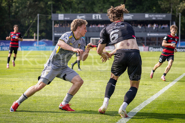 German 3rd Division, Viktoria Koeln vs. Alemannia Aachen, 10.05.2026 | KOELN, GERMANY - MAY 10, 2026: Jonas Oehmichen (Alemannia Aachen, 24) is challenged by Tobias Eisenhuth (Viktoria Köln, 6) during the 3rd division match on gameday 37 between Viktoria Koeln vs. Alemannia Aachen at the Sportpark Hoehenberg on May 10, 2026 in Koeln, Germany. DFL REGULATIONS PROHIBIT ANY USE OF PHOTOGRAPHS AS IMAGE SEQUENCES AND/OR QUASI-VIDEO.