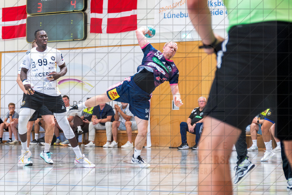 IHC 2026 - TSV Hannover-Burgdorf vs. PAUC Handball | Justus Fischer (TSV Hannover-Burgdorf #54); IHC 2026 - TSV Hannover-Burgdorf vs. PAUC Handball am 08.08.26 in Sporthalle KGS, Schneverdingen - Realisiert mit Pictrs.com