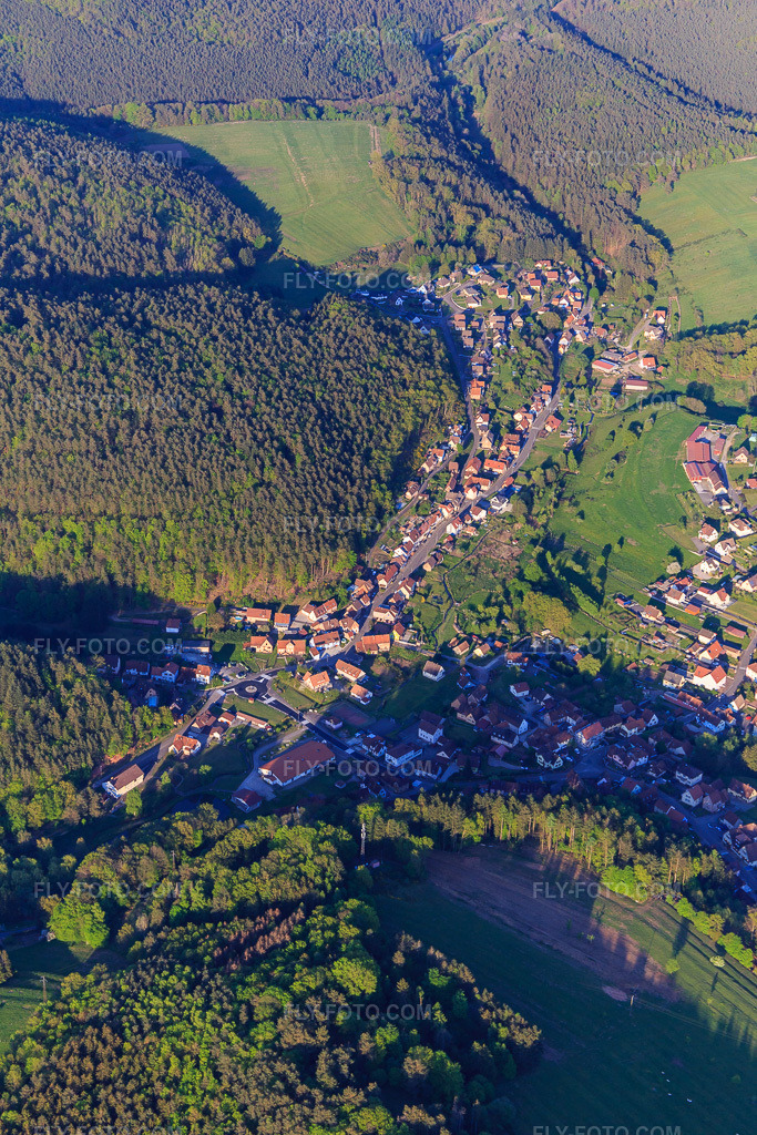 Aerial view: Rue de Hasenthal in Reipertswiller in the state Bas-Rhin, France. – Photo: IMG_145791.jpg taken on 04/30/2025 by Werner Riehm/FLY-FOTO.com – Resolution of the original: 3648 x 5472 px