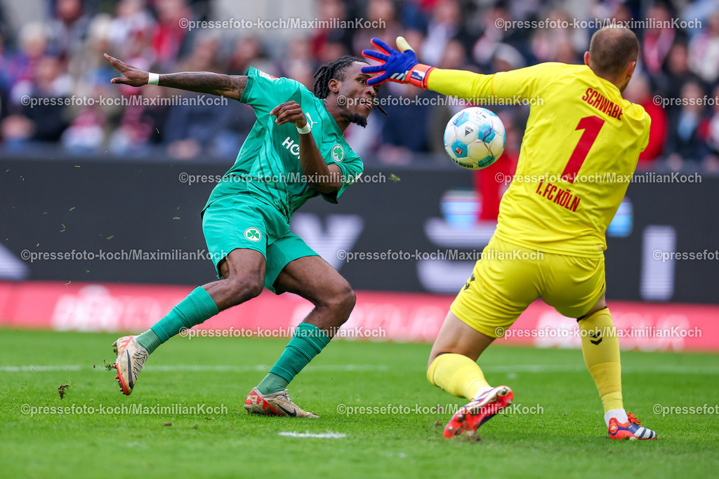 Koe09112401016 | 09.11.2024, 1. FC Köln - SpVgg Greuther Fürth, 2. Fußball Bundesliga, RheinEnergieSTADION, Saison 2024 2025: Noel Futkeu (Greuther Fürth #9)  scheitert an Torwart Marvin Schwäbe (1.FC Köln #1)DFB regulations prohibit any use of photographs as image sequences and or quasi-video.