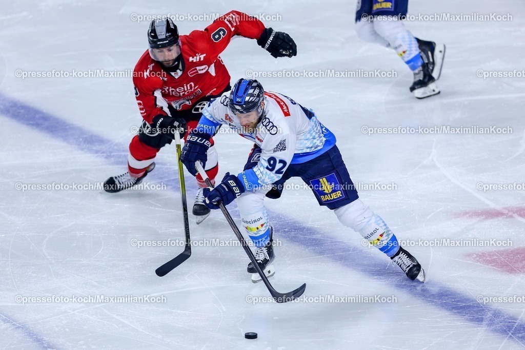 KEC1404251059 | 14.04.2025, Eishockey, DEL Play-offs, Kölner Haie - ERC Ingolstadt, Halbfinale Spiel 6, Lanxess-Arena Köln: Maximilian Kammerer (Kölner Haie #9) im Zweikampf gegen Daniel Schmölz (ERC Ingolstadt #92) 