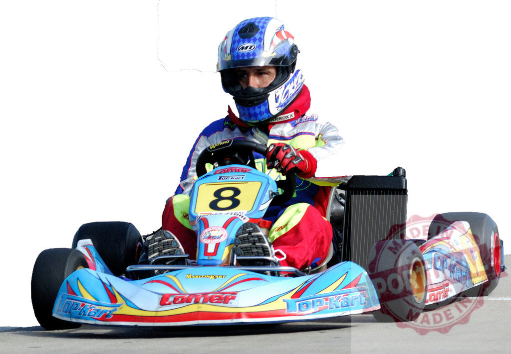 Kart driver racing on a go-kart track | Professional kart driver racing on a colorful go-kart on a circuit - Realisiert mit Pictrs.com