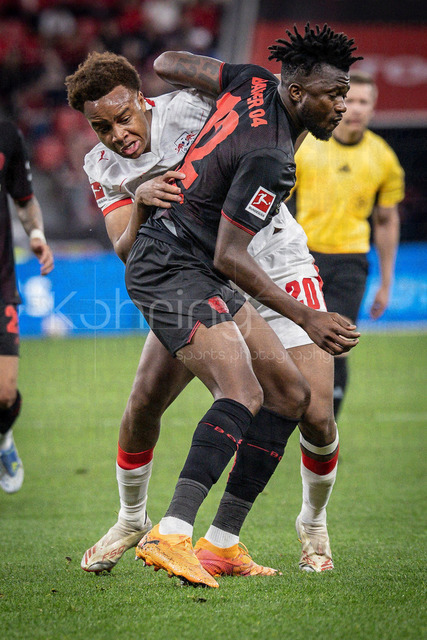 German Bundesliga, Bayer 04 Leverkusen vs. RB Leipzig, 02.05.2026 | LEVERKUSEN, GERMANY - MAY 2, 2026 :  Assan Quedraogo (RB Leipzig, 20), Edmond Tapsoba (Bayer 04 Leverkusen, 12) tackling during the German Bundesliga match on gameday 32 between Bayer 04 Leverkusen vs. RB Leipzig at BayArena on May 2, 2026 in Leverkusen, Germany. DFL REGULATIONS PROHIBIT ANY USE OF PHOTOGRAPHS AS IMAGE SEQUENCES AND/OR QUASI-VIDEO.