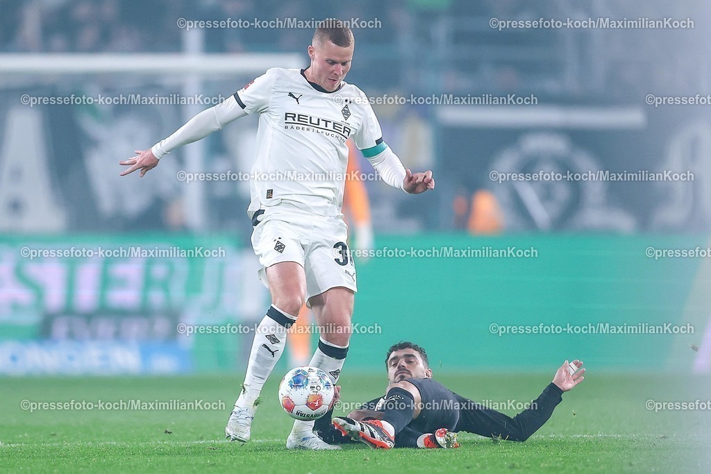 BMG13032601016 | 13.03.2026, Fußball, Borussia Mönchengladbach - FC St. Pauli, 1. Fußball Bundesliga, 26.Spieltag, Borussia-Park, Saison 2025 2026: Nico Elvedi&nbsp;(Borussia Mönchengladbach #30) im Zweikampf gegen  Danel Sinani&nbsp;(FC St.Pauli #10)  DFB regulations prohibit any use of photographs as image sequences and or quasi-video.