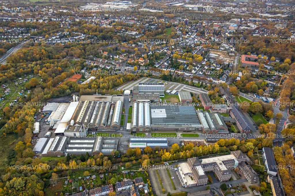 Bochum231102517 | Luftbild, Werksgelände Eickhoff Maschinenfabrik GmbH Maschinenbauunternehmen, Firmrngebäude der G DATA CyberDefense AG Softwarehersteller, Rechtwinkeliges Gebäude Verwaltungssitz Berufsgenossenschaft Rohstoffe & chemische Industrie Bezirksdirektion, Baustelle für Projekt Wohnen und Arbeiten an der Hunscheidtstraße und Waldring mit herbstlichen Laubbäumen, Wohngebiet mit herbstlichen Laubbäumen und Ortsansicht Wiemelhausen, Bochum, Ruhrgebiet, Nordrhein-Westfalen, Deutschland