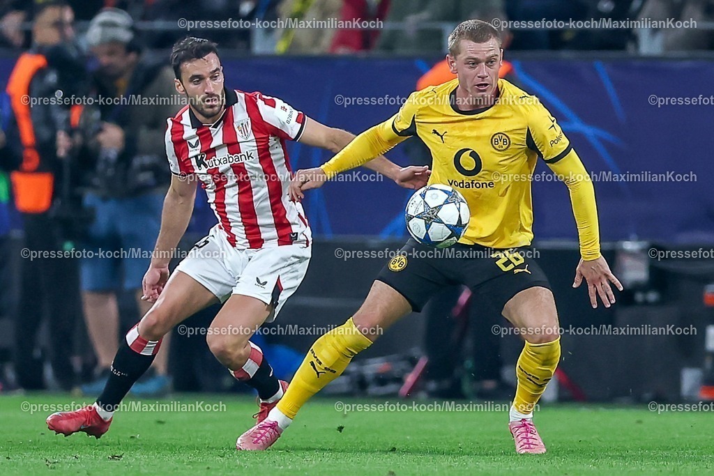UCL01102501049 | 01.10.2025, Fußball, UEFA Champions League, Borussia Dortmund - Athletic Club Bilbao, BVB Stadion, 2. Spieltag, Saison 2025 2026: Julian Ryerson (BVB #26) im Zweikampf gegen   Regulations prohibit any use of photographs as image sequences and or quasi-video.