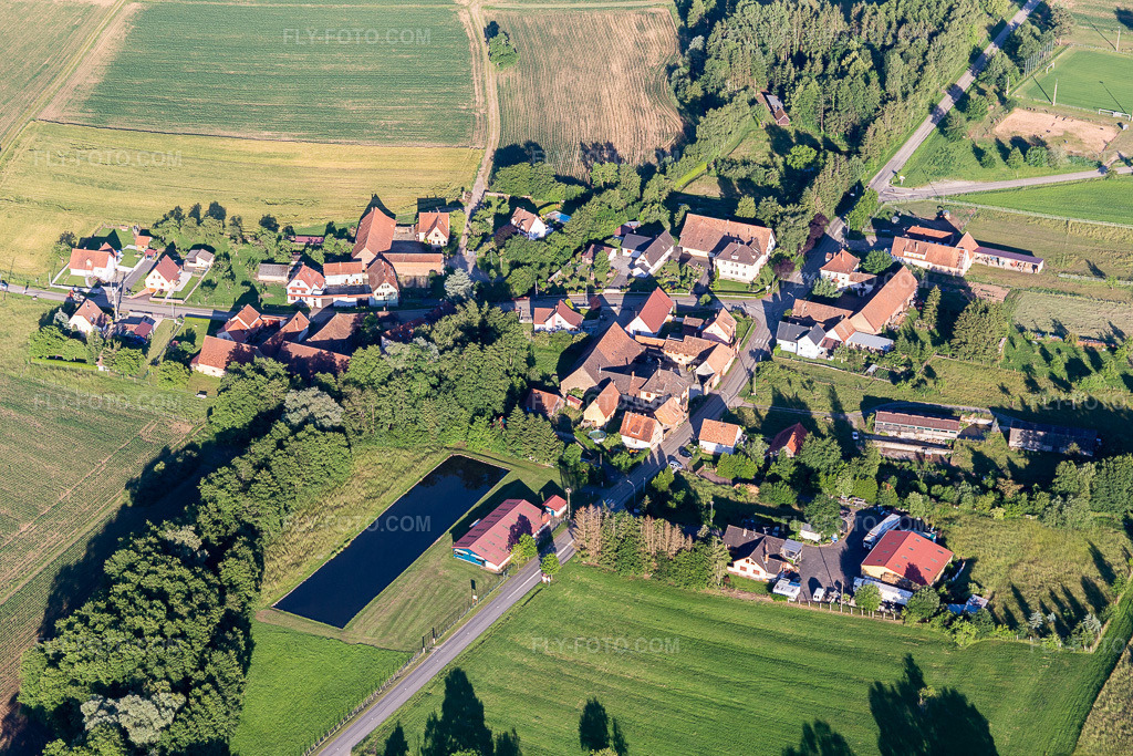 Aerial view: Moulin de Niefern in Uhrwiller in the state Bas-Rhin, France. – Photo: IMG_115432.jpg taken on 06/16/2019 by Werner Riehm/FLY-FOTO.com – Resolution of the original: 5472 x 3648 px